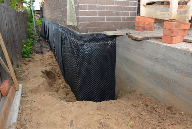 SJ Waterproofing Pros technician performing targeted Exterior Waterproofing assessment in Palestine, OH